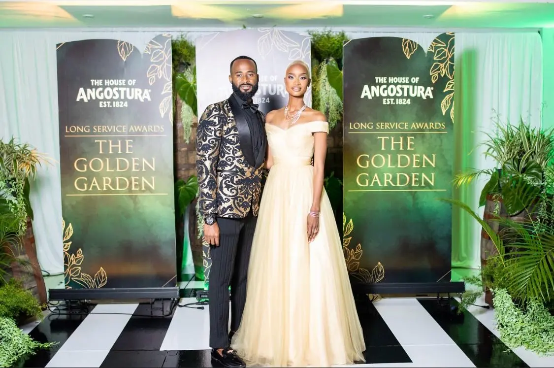 Ainka Will hosting the Angostura Golden Garden awards in a white gown